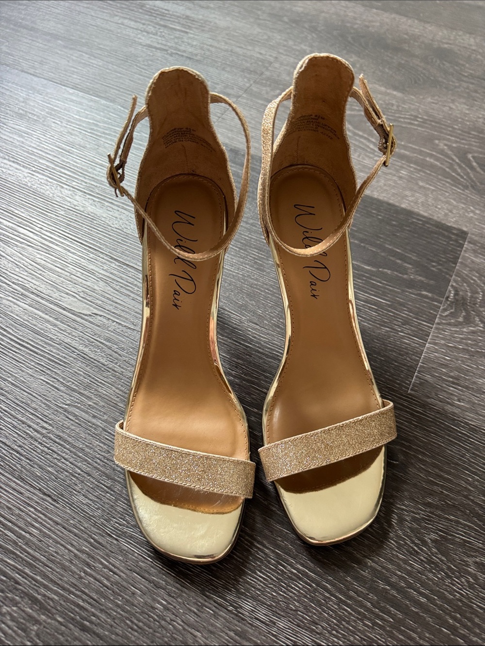 Wild Pair open toe heels. 3 and 3/4 inch heel. Beautiful gold and subtle sparkle
